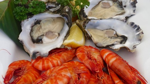 Freshly shucked local oysters and tiger prawns